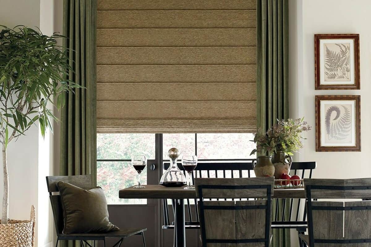 Hunter Douglas Design Studio™ Roman Shades in a dining room