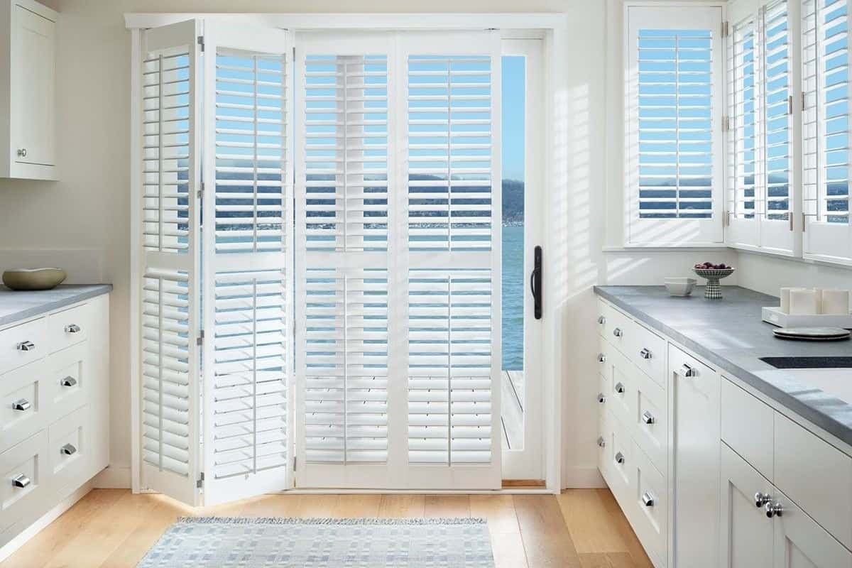 Image of Palm Beach™ Polysatin™ Vinyl Shutters in a kitchen